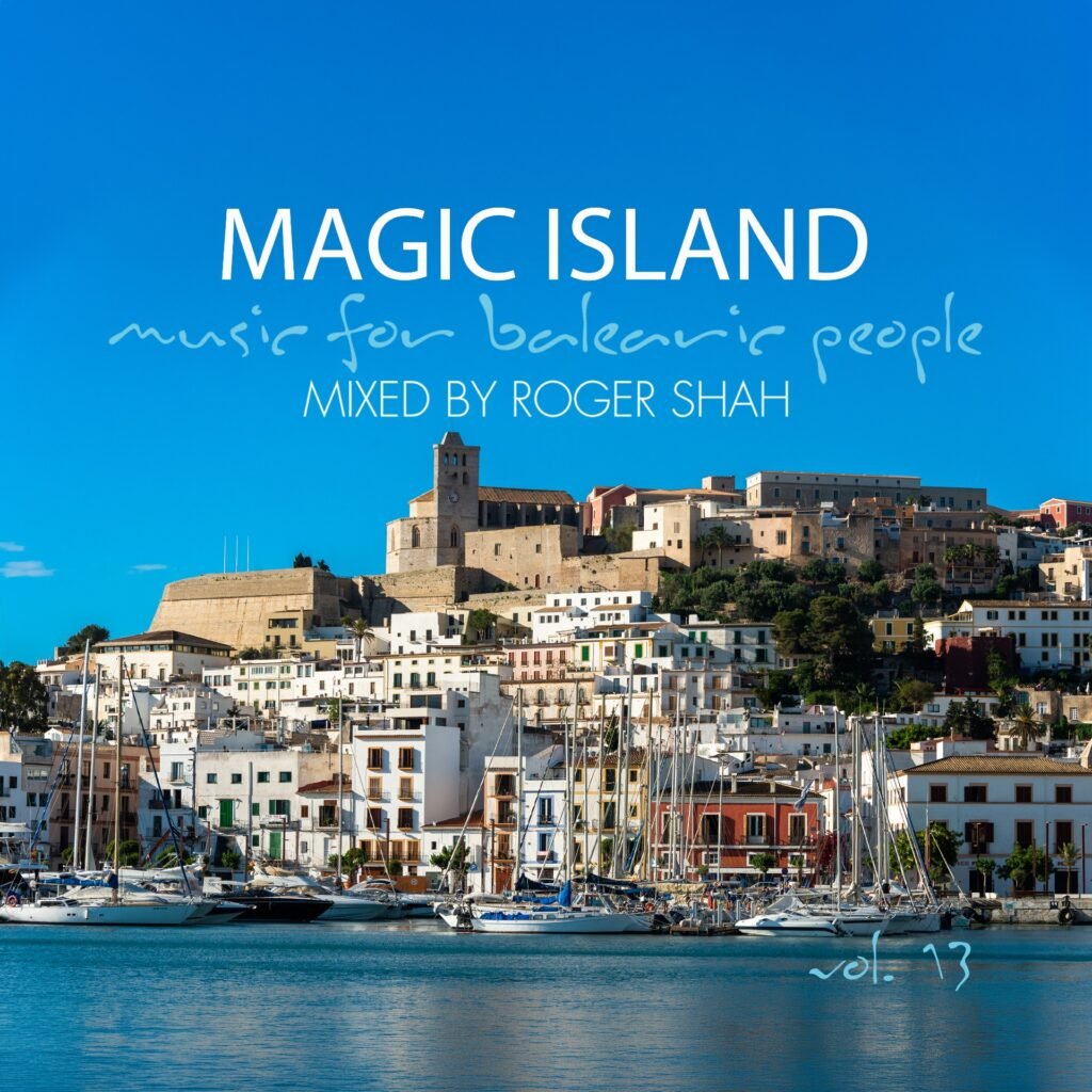 Album cover showing a bright blue sky over a harbor town with white buildings and moored yachts; text reads 'MAGIC ISLAND' and 'music for balcony people' with 'MIXED BY ROGER SHAH' beneath.